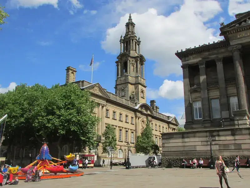 The Flag Market in Preston, with the clock tower of the Sessions House and the columns of the Harris Museum